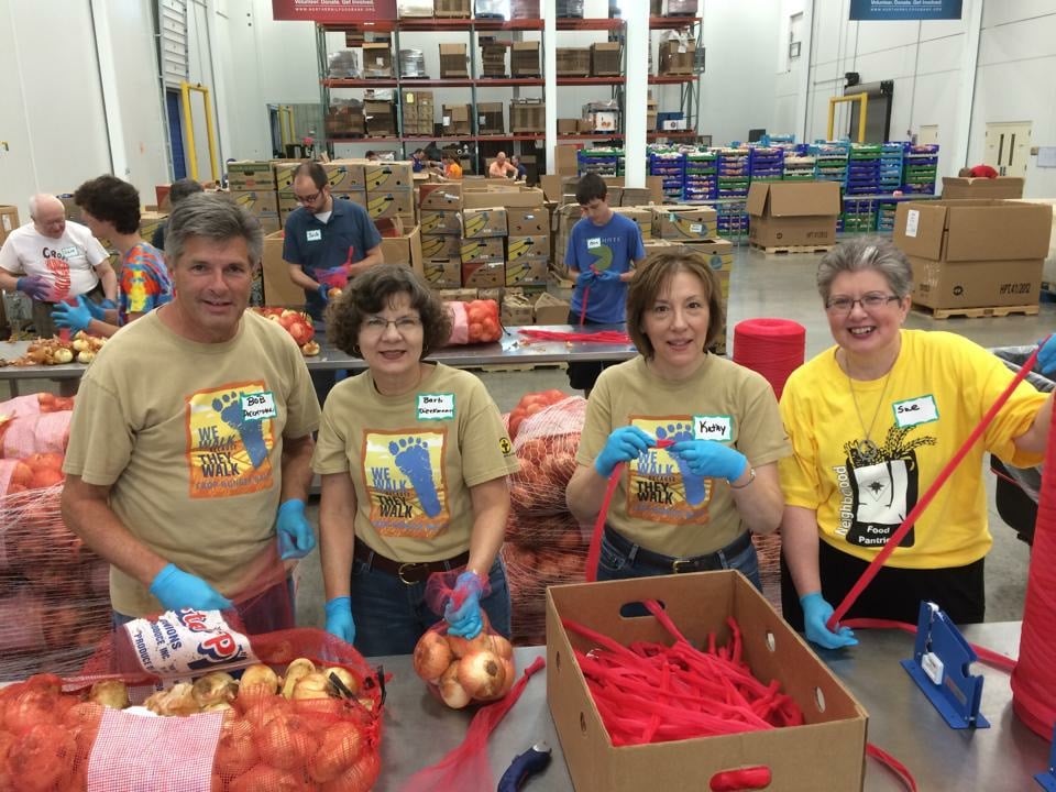 “A church group from West Chicago puts faith into action, working in Northern Illinois Food Bank’s processing room. Thanks to volunteers, partners, and donors, a gift of $1 provides $8 worth of groceries to neighbors in need in Northern Illinois."